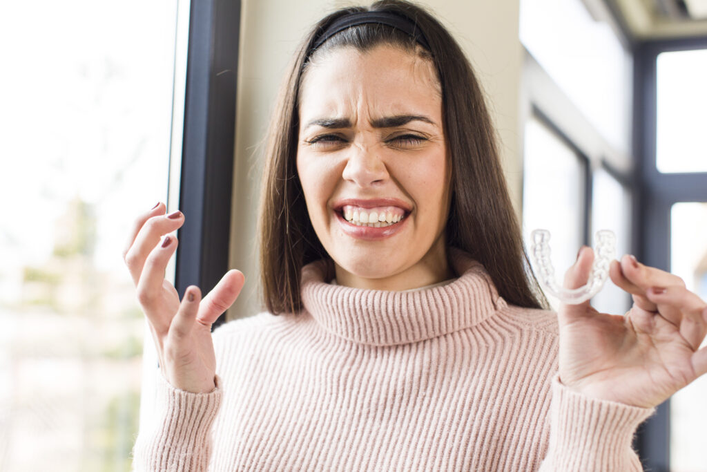 Pretty Young Woman With Dental Retainer House Interior Design