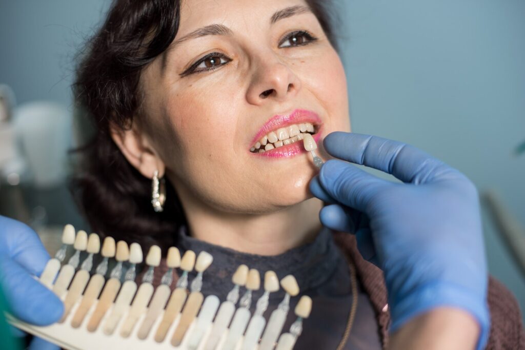 Close Up Portrait Woman Dental Clinic Office Dentist Checking Selecting Colour Teeth Making Process Treatment Dentistry 10069 3672 Close Up Portrait Woman Dental Clinic Office Dentist Checking Selecting Colour Teeth Making Process Treatment Dentistry 10069 3672