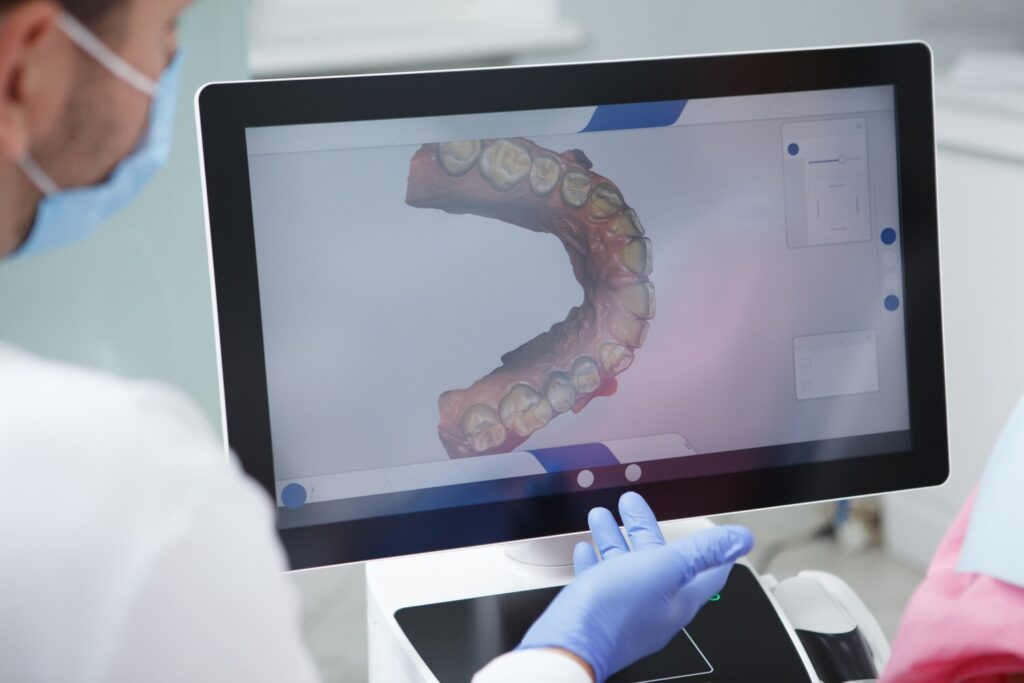 Cropped Close Up Dentist Examining Teeth Scan Computer 118628 3749